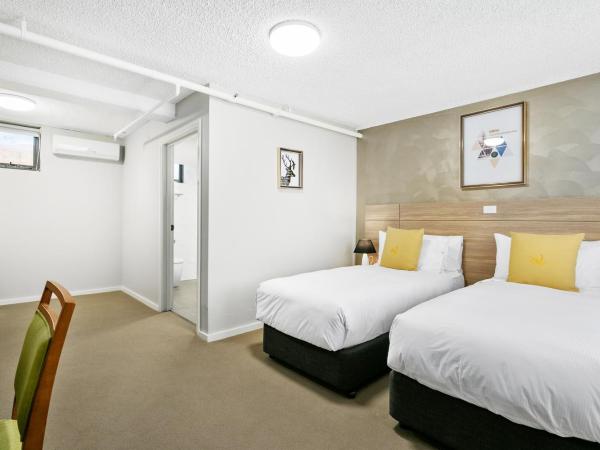 Quality Inn Sunshine Haberfield : photo 1 de la chambre chambre lits jumeaux supérieure