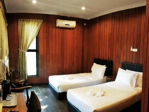 Kinabatangan Wildlife Lodge : photo 1 de la chambre twin room with transfer