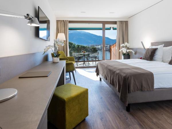 Hotel Lago Maggiore - Welcome! : photo 5 de la chambre chambre double ou lits jumeaux exclusive avec vue sur le lac