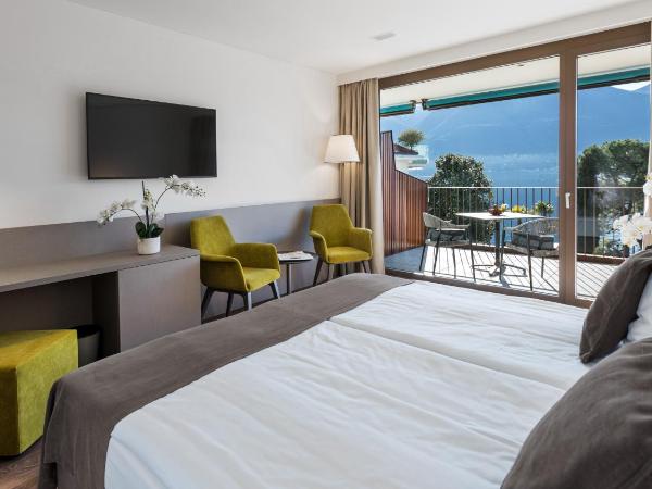 Hotel Lago Maggiore - Welcome! : photo 6 de la chambre chambre double ou lits jumeaux exclusive avec vue sur le lac