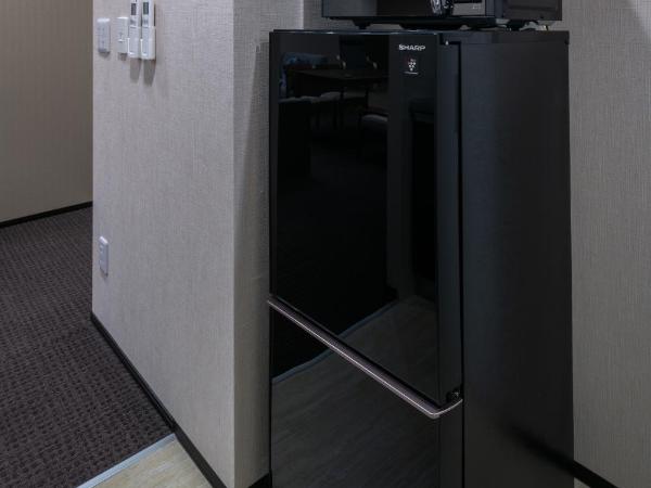 Randor Residence Susukino Suites : photo 9 de la chambre suite lit king-size avec baignoire spa