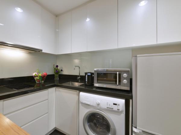 Grande Centre Point Ploenchit : photo 8 de la chambre suite balcon angle