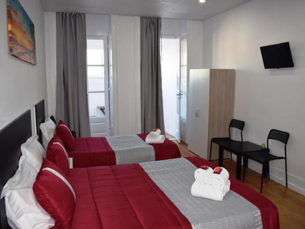 Guest House Henrique VIII : photo 2 de la chambre chambre triple