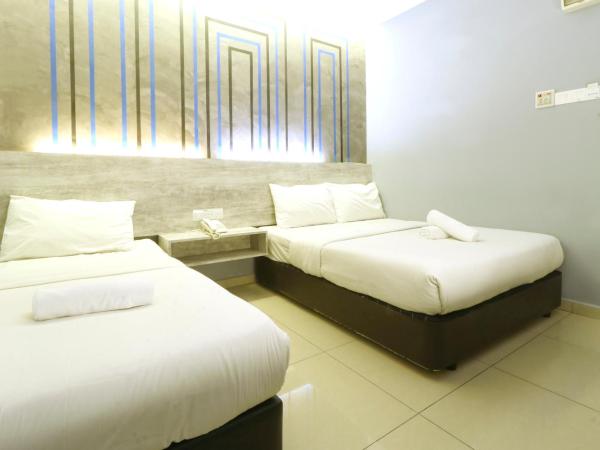 Suite Dreamz Hotel : photo 1 de la chambre chambre triple