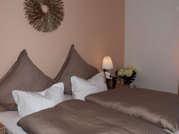 Hotel- Restaurant Kerzan´s : photo 6 de la chambre chambre triple avec salle de bains