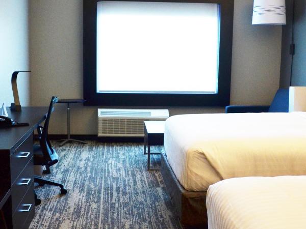 Holiday Inn Express & Suites - Jacksonville W - I295 and I10, an IHG Hotel : photo 1 de la chambre suite disposant de 2 lits queen-size