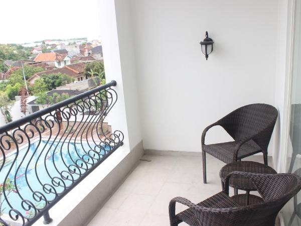 Grand Rohan Jogja : photo 3 de la chambre chambre double deluxe avec balcon