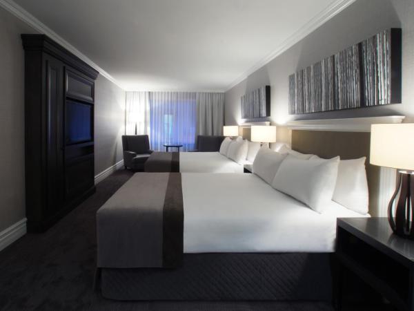 Hotel Manoir Victoria : photo 1 de la chambre chambre deluxe avec 2 lits doubles