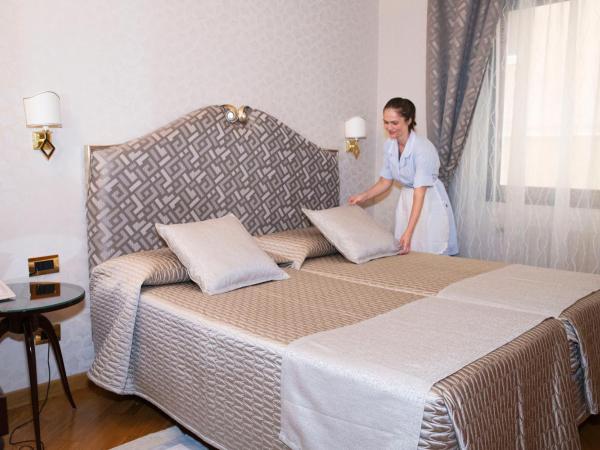 Hotel Europa : photo 4 de la chambre chambre lits jumeaux