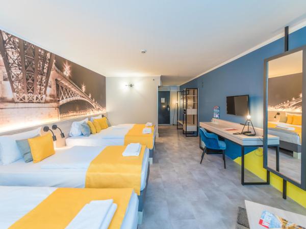 Impulso Fashion Hotel : photo 2 de la chambre chambre quadruple confort