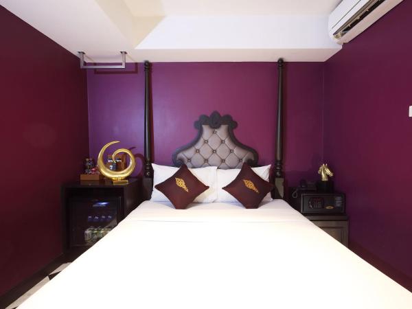 Violet Tower at Khaosan Palace : photo 2 de la chambre chambre double violet