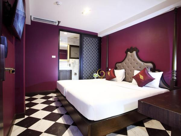 Violet Tower at Khaosan Palace : photo 2 de la chambre chambre lits jumeaux violette