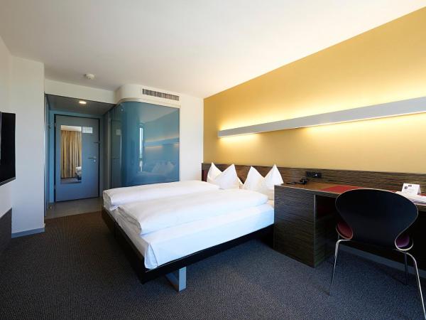 Hotel Ambassador : photo 6 de la chambre chambre double ou lits jumeaux - vue sur ville