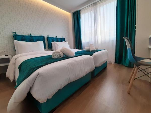 Athenian Montaza Hotel : photo 3 de la chambre chambre lits jumeaux