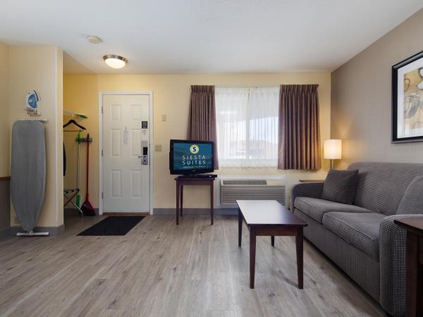 Siesta Suites : photo 7 de la chambre suite lit queen-size de luxe avec canapé-lit