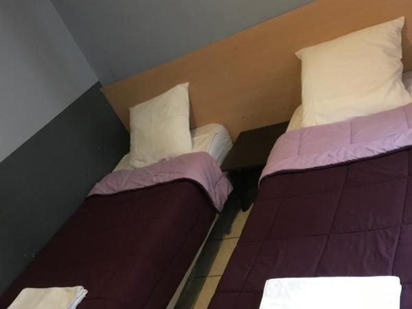 FM Hotel : photo 2 de la chambre chambre lits jumeaux