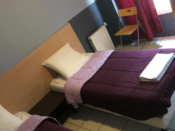 FM Hotel : photo 3 de la chambre chambre lits jumeaux