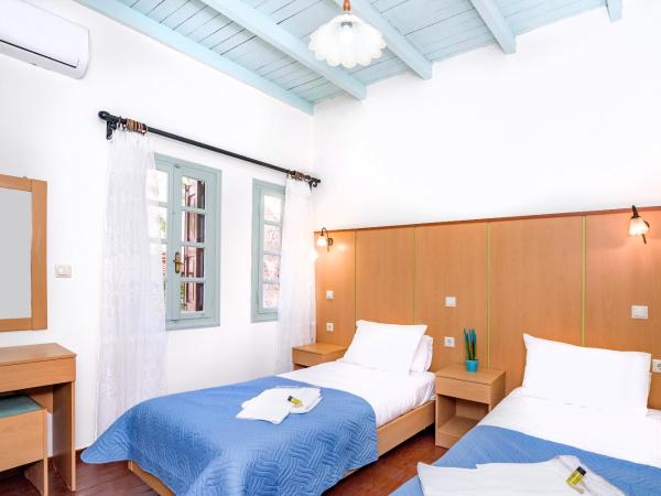 Alegria Pension : photo 1 de la chambre chambre lits jumeaux avec salle de bains privative