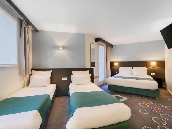 Kyriad Lille Gare - Grand Palais : photo 1 de la chambre chambre avec 1 lit double et 2 lits simples