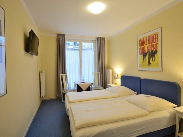 ALPHA Hotel Garni : photo 4 de la chambre chambre lits jumeaux standard