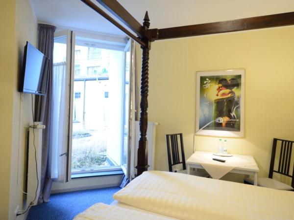 ALPHA Hotel Garni : photo 2 de la chambre chambre simple