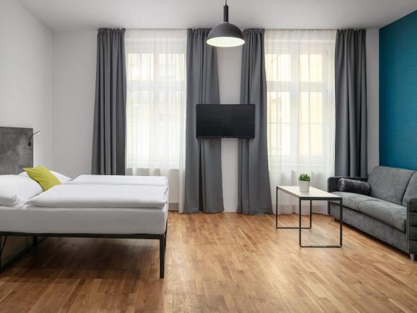 EA ApartHotel Melantrich : photo 8 de la chambre studio avec parking gratuit