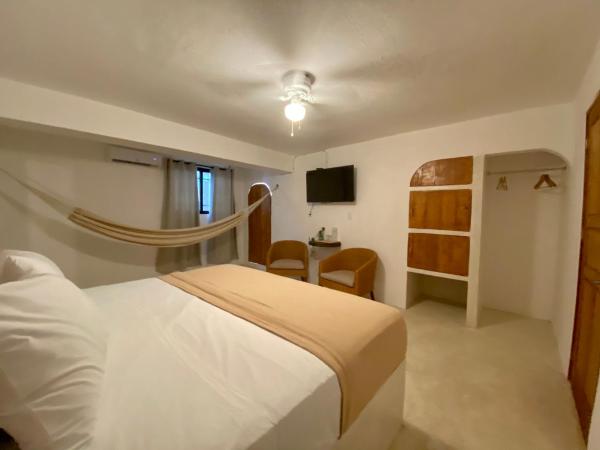 MIO Cancún Hotel Boutique : photo 3 de la chambre suite deluxe avec lit king-size