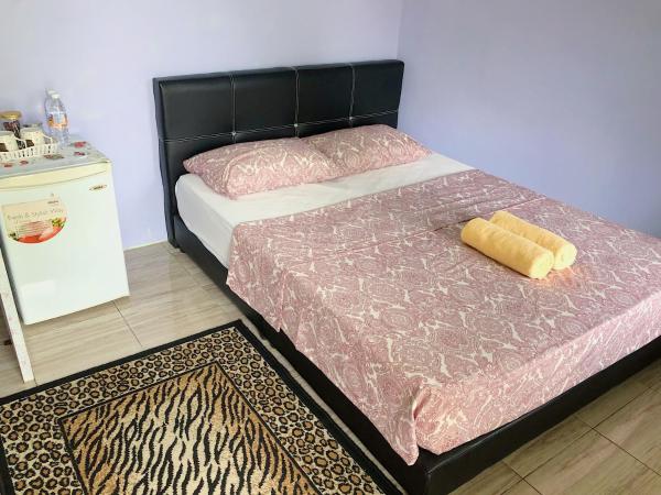 Merdeka Guest House 2 : photo 6 de la chambre chambre lit queen-size deluxe