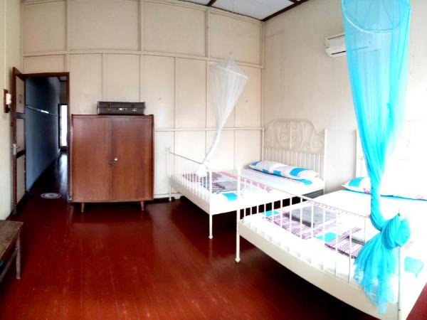 Voyage Home&Guesthouse : photo 2 de la chambre chambre quadruple avec salle de bains commune