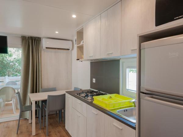 Club del Sole Jesolo Mare Family Camping Village : photo 7 de la chambre mobile home de luxe