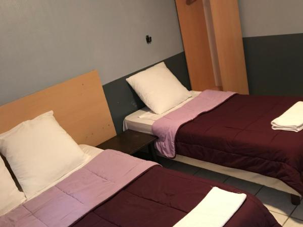 FM Hotel : photo 2 de la chambre chambre triple