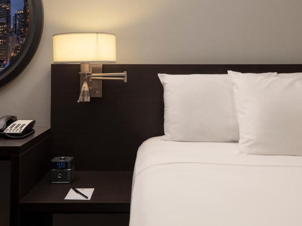 Executive Hotel Pacific : photo 2 de la chambre chambre lit queen-size deluxe