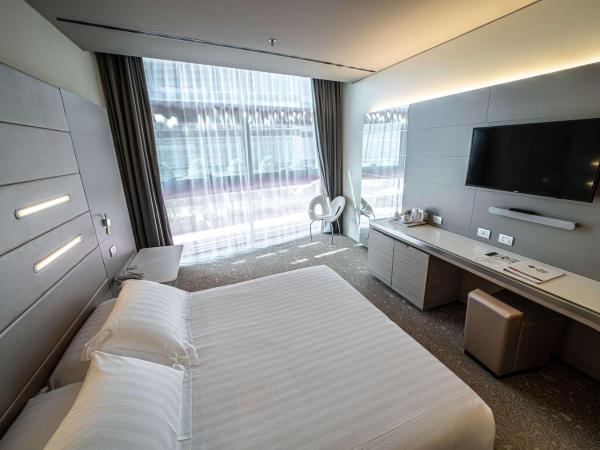 Best Western Plus Net Tower Hotel Padova : photo 1 de la chambre chambre standard lit queen-size