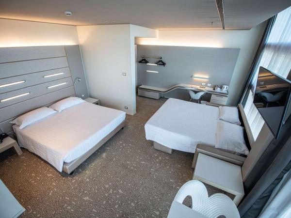 Best Western Plus Net Tower Hotel Padova : photo 5 de la chambre chambre lit queen-size confort avec lit d'appoint simple