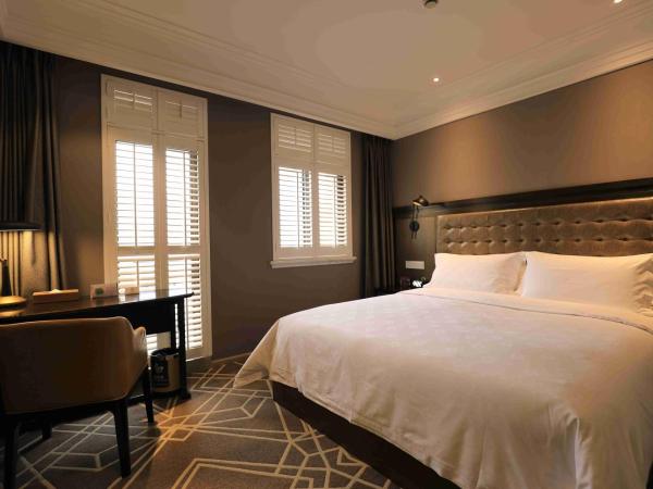 Jinjiang Metropolo Hotel Classic Nanjing Road (East) Shanghai : photo 4 de la chambre chambre double super design