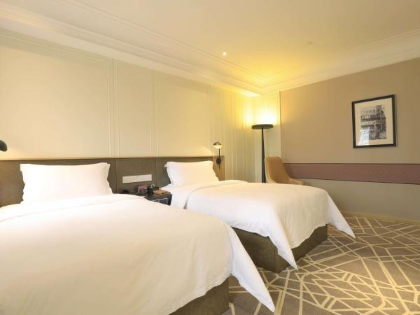 Jinjiang Metropolo Hotel Classic Nanjing Road (East) Shanghai : photo 4 de la chambre chambre lits jumeaux design extrême
