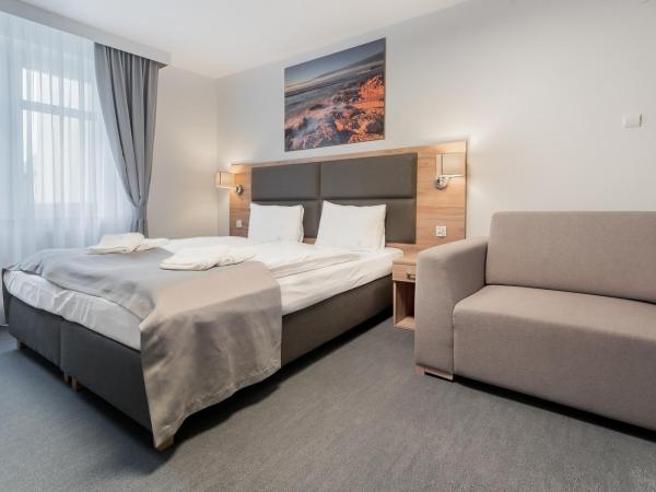 Harmony House : photo 6 de la chambre chambre quadruple avec salle de bains privative