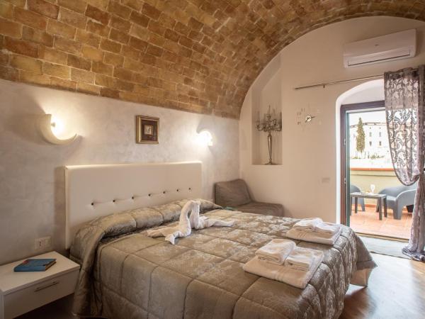 L' Infinito dei Sassi : photo 7 de la chambre chambre double ou lits jumeaux deluxe - vue sur ville