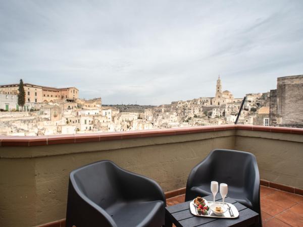 L' Infinito dei Sassi : photo 9 de la chambre chambre double ou lits jumeaux deluxe - vue sur ville