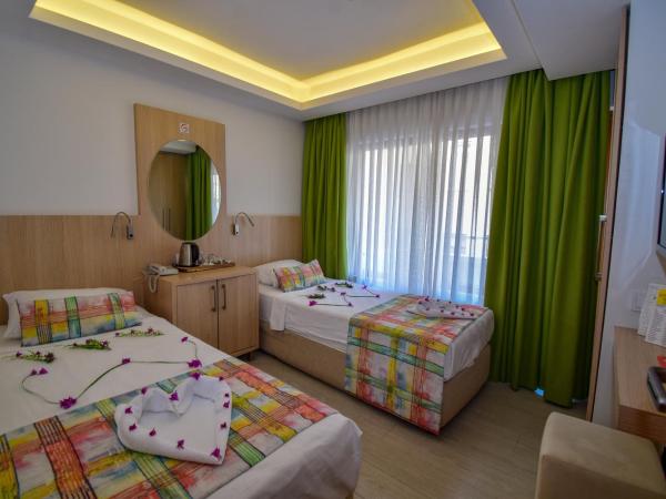 City Hotel Marmaris : photo 5 de la chambre chambre lits jumeaux standard