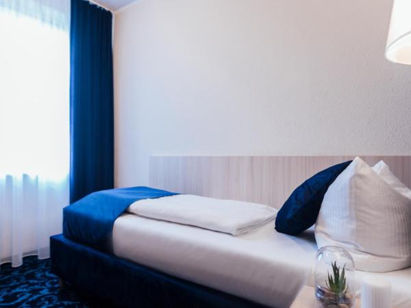 Hotel CULT Hamburg : photo 7 de la chambre chambre quadruple classique