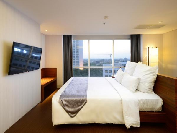 CROWN PRINCE Hotel Surabaya Managed by Midtown Indonesia : photo 1 de la chambre chambre confort