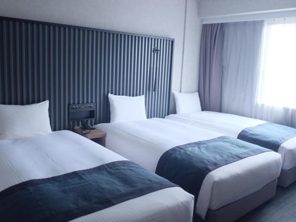 THE KNOT TOKYO Shinjuku : photo 1 de la chambre 20sqm deluxe triple room on high floor - non-smoking