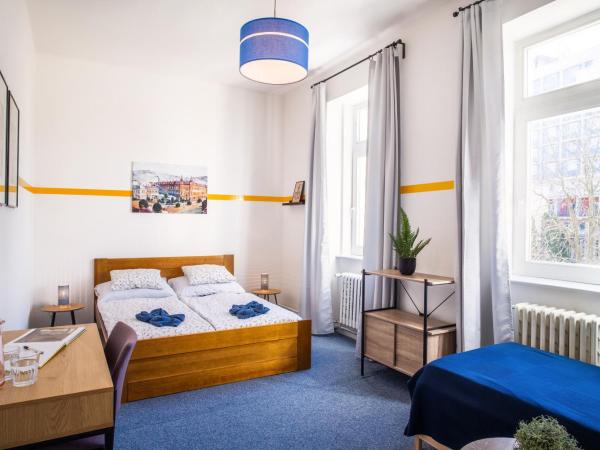 Internesto Brno : photo 1 de la chambre chambre quadruple avec salle de bains commune