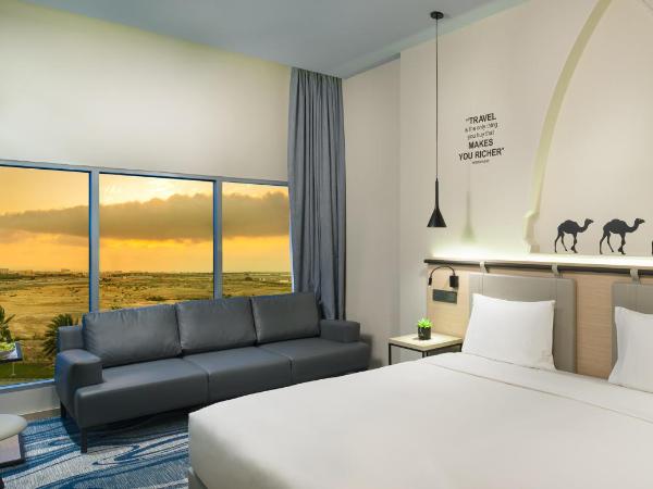Swiss-Belinn Airport Muscat Oman : photo 1 de la chambre chambre lit king-size deluxe