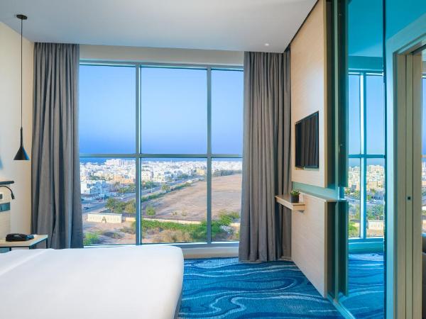 Swiss-Belinn Airport Muscat Oman : photo 3 de la chambre suite