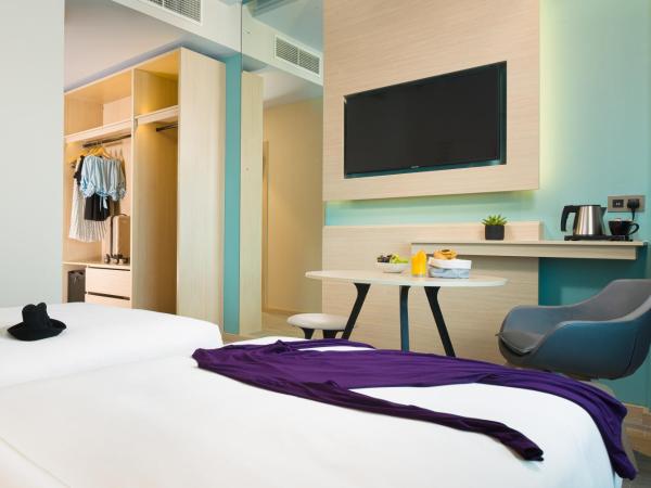 Swiss-Belinn Airport Muscat Oman : photo 4 de la chambre chambre lits jumeaux supérieure