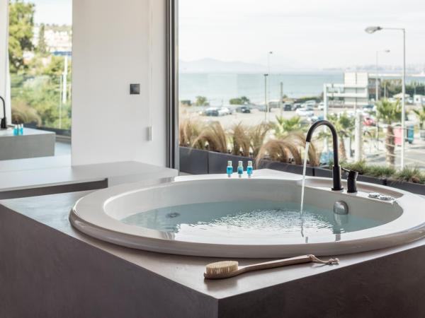 Urban Suites : photo 3 de la chambre suite supérieure - vue sur mer