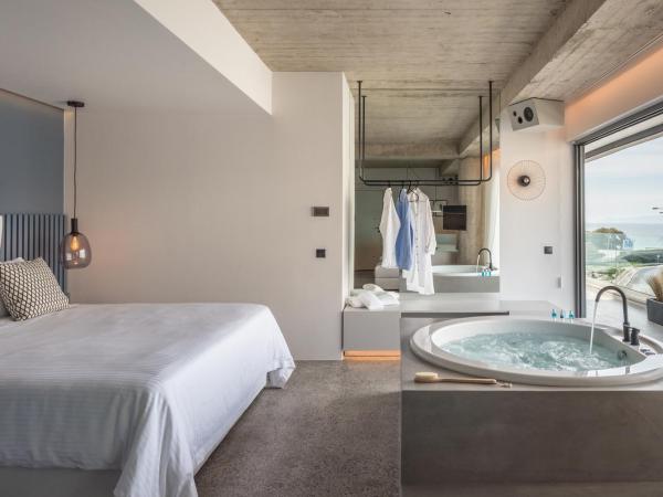 Urban Suites : photo 1 de la chambre suite supérieure - vue sur mer