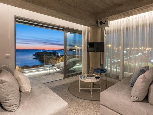 Urban Suites : photo 7 de la chambre suite lit king-size - vue sur mer